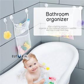 img 3 attached to 🛁 Eutuxia Bath Toy Organizer - Quick-Dry Hanging Mesh Net for Kids Toys & Bathroom Essentials. Shower Caddy with 4 Pockets, 4 Adhesive Hooks. Fun, Educational Decor. Size: 19.76" x 14".