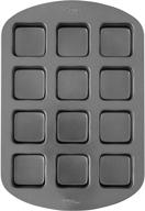 premium non-stick 12-cavity bar baking pan by wilton, crafted from steel with perfect results logo