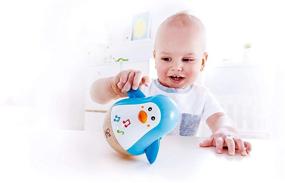 img 3 attached to 🐧 Hape Penguin Musical Wobbler - Colorful Roly Poly Toy for Kids 6 Months+ (E0331)