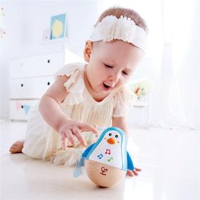 img 2 attached to 🐧 Hape Penguin Musical Wobbler - Colorful Roly Poly Toy for Kids 6 Months+ (E0331)