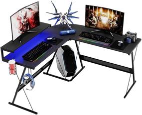 img 4 attached to Лучший игровой стол Bestier 51" в форме L-буквы - эргономичный черный компьютерный стол из углеродного волокна с RGB-полосой, полкой, крюком для наушников и держателем для чашек - легкий в сборке