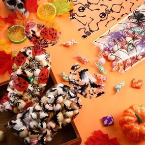 img 1 attached to 🎃 100-Piece Halloween Cello Bags with Twist Ties - Clear Candy Goodie Treat Bags in 4 Assorted Styles for Kids Halloween Party Decorations