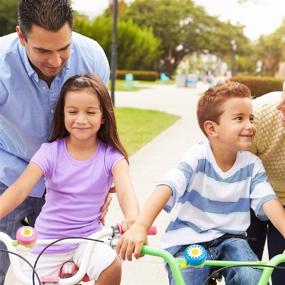 img 1 attached to WENTS Kids Bike Accessories Set: Sunflower Shaped Bike Bell 🌻 and Handlebar Tassel Streamers – Ideal for Boys and Girls (Pink, Blue)