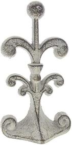 img 4 attached to 🚪 Fleur De Lis Cast Iron Door Stop - Vintage Design, Decorative Door Stopper Wedge with Padded Anti-Scratch Felt Bottom - 4x3.5x7.5