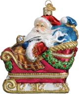 multi-colored old world christmas santa in sleigh ornament logo