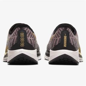 img 2 attached to Powerful Performance: Nike Zoom Pegasus Turbo 2 Women's Running Shoe in Black/Infinite Gold-Plum Chalk, Size 10