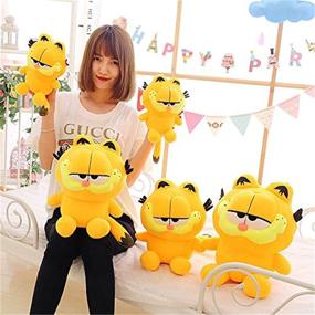 img 1 attached to 🐱 Adorable Garfield The Cat Plush Dolls Gifts Toys Plush Pillows for Boys and Girls - Yellow Cat Animal Cartoon Figures (25 cm, 1 Piece)