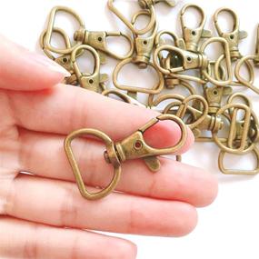 img 4 attached to 🔗 YIXI-SBest 20Pcs 360° Metal Swivel Trigger Snap Hooks Lobster Claw Clasps - Wide 3/4 Inch D Ring - Keychain Hooks, 20mm ID, 40mm Length (3/4” Antique Brass)