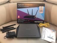 🌐 netgear nighthawk r7000 - dual band wireless router with 4-port gigabit ethernet switch - 802.11a/b/g/n/ac compatibility logo