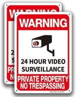 surveillance property trespassing protected resistant logo