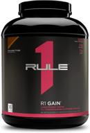 rule one proteins r1 gain - chocolate fudge: high-protein lean gain formula with 50g all-whey protein, over 500 calories, 75g carbs, under 6g fat, 5lbs, 16 servings logo