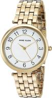 anne klein ak 2700wtgb gold tone logo