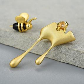 img 1 attached to 🐝 Lotus Fun Unique Handmade Jewelry: S925 Sterling Silver Bee and Dripping Honey Asymmetric Stud Earrings for Women and Girls - Enhance Your Style!