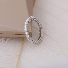 img 2 attached to 💍 DovEggs Solid 10K White Gold 1.2CTW Moissanite Eternity Engagement Ring Wedding Band: G-H-I Color | 2.5mm Width | Women's Jewelry