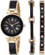 🌟 anne klein women's premium crystal accent gold-tone and black bangle watch set, ak/3374bkst logo