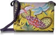 anuschka genuine leather medium flap-over cross body bag - hand painted original artwork, inspired by tuscan paradise logo