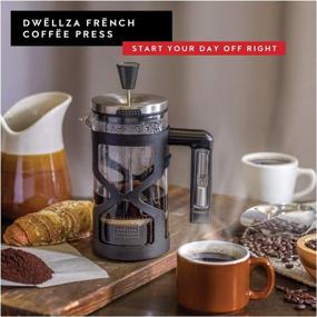 img 2 attached to Кофеварка Dwëllza Kitchen French Press - Ручка с 3-минутным таймером, 34 унции, Тройная система фильтрации, В комплекте 2 дополнительных фильтра, Стеклянная кофеварка French Press с защитой черный корпус.