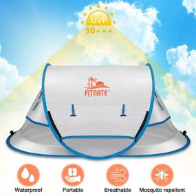 img 3 attached to 🏖️ FITNATE Portable Baby Beach Tent, Infant & Toddler Travel Bed, UPF 50+ Sun Shelter with Moisture-Proof Pad, Pop Up Design with Storage Bag and 2 Pegs - Perfect for Beach, Grass, and Indoor Use