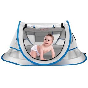 img 4 attached to 🏖️ FITNATE Portable Baby Beach Tent, Infant & Toddler Travel Bed, UPF 50+ Sun Shelter with Moisture-Proof Pad, Pop Up Design with Storage Bag and 2 Pegs - Perfect for Beach, Grass, and Indoor Use