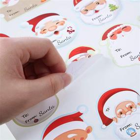 img 3 attached to 320-Piece Christmas Santa Name Tags Stickers - Festive Santa Wrapping Labels for Holiday Festival, Birthday 🎅 Party Decor - Cute Santa Claus Designs - Christmas Tree Santa Name Labels Stickers - 16 Designs