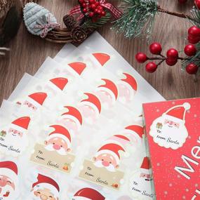 img 2 attached to 320-Piece Christmas Santa Name Tags Stickers - Festive Santa Wrapping Labels for Holiday Festival, Birthday 🎅 Party Decor - Cute Santa Claus Designs - Christmas Tree Santa Name Labels Stickers - 16 Designs