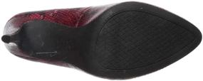 img 1 attached to Туфли Parisah черного цвета с змеиным принтом для женщин от Jessica Simpson - стильная женская обувь.
