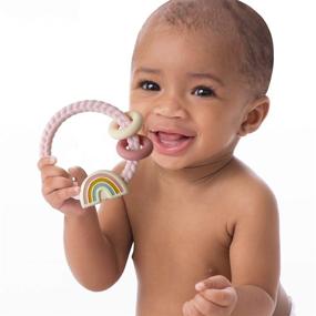 img 2 attached to 🌈 Itzy Ritzy Silicone Teether with Rattle - Soothing Gums with Rattle Sound, Rings, and Raised Texture - Ages 3 Months+, Rainbow Design