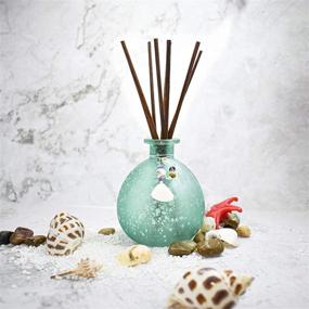 img 2 attached to Ocean Mist Reed Diffuser Set - Elegant Home Décor, Bathroom & Office Fragrance Gift - Aromatherapy Oil Refill 3.4 fl oz with 8 Reed Sticks - Blue Snowflake Round Bottle