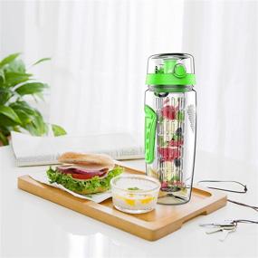 img 2 attached to 🍓 32 oz Fruit Infuser Water Bottle: Hydration with Flavored Water, Tea Infusion - Sports Container for Protein Shake, Leak-Proof Lid & Long Infuser Basket - Includes Sleeve, Cleaner Brush & Mix Ball