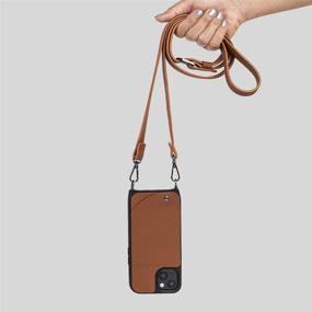 img 1 attached to Noémie Napa Crossbody Case for iPhone 13 - 📱 Genuine Leather, Removable Strap, 3 Credit Card Holder - Tan/Black