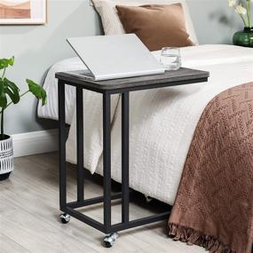 img 1 attached to VASAGLE Industrial End Table with Rolling Casters in Charcoal Gray - Perfect for Living Room or Bedroom Decor