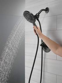 img 3 attached to 🚿 Delta Arvo Shower Faucet with 4-Spray Dual Hand Held Shower Head, Matte Black - Complete Kit (Valve Included)