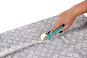 img 1 attached to SINGER Seam Roller: Achieve Perfect Seams with Teal/Black/White Design