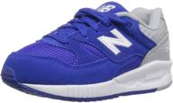 new balance boys running shoe logo