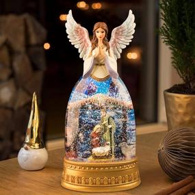 img 4 attached to 12.6-Inch Lighted Christmas Snow Globe Nativity Angel Figurine with Musical Lantern, Swirling Glitter, and Water
