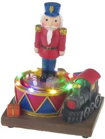 img 4 attached to Lightahead LED Lighted Turning Nutcracker Soldier: Musical Christmas Scene Decoration with 8 Melodies Tabletop Centerpieces