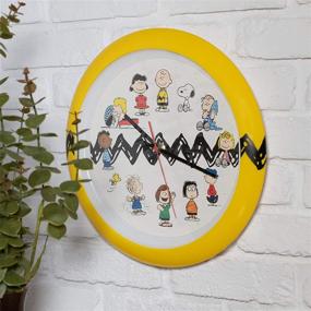 img 3 attached to 🕐 Stylish 13 Inch Zig Zag Yellow and Black Wall Clock featuring Mark Feldstein Peanuts Characters