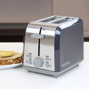 img 1 attached to 🍞 West Bend 78823 Silver 2 Slice Toaster: Extra Wide Slots, Bagel Settings, Ultimate Toast Lift, Removable Crumb Tray