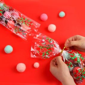 img 1 attached to 🎄 KIMOBER 144pcs Christmas Candy Treat Bags: Festive Cellophane Goodies with Twist Ties for Memorable Christmas Party Favors