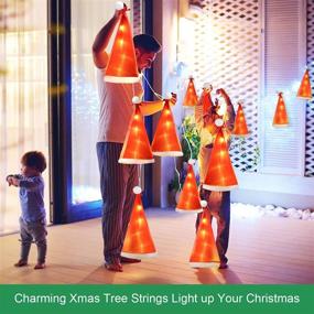 img 1 attached to 🎅 Santa Hat String Lights - 6-Pack Christmas Decoration, Waterproof Fairy Lights with 18 LEDs, 8.2ft, USB/Battery Powered, Glowing Home Garden Patio Party Decor (Red Santa Hat)