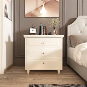 img 4 attached to 🛏️ White Bedside Table Cabinet with Wooden Legs and Handle - Recaceik Mid-Century 3 Drawers Nightstand for Bedroom Furniture