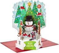 🎄 captivating hallmark paper wonder pop up christmas card with lights and music - playfully serenades 'rockin' around the christmas tree' logo