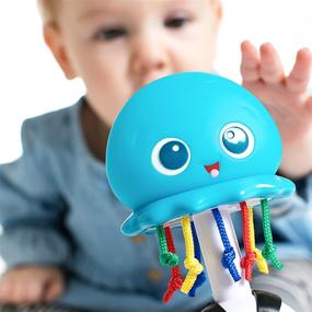 img 3 attached to 👶 Newborn+ Baby Einstein Ocean Glow Sensory Shaker Musical Toy for Enhanced Sensory Development