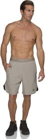 img 1 attached to 🩳 Dry FIT Gym Shorts for Men: Top-Notch Moisture-Wicking Workout Running Shorts with Pockets and Side Hem