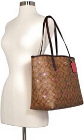 img 1 attached to 👜 Signature Canvas Brown Handbags & Wallets for Women by COACH