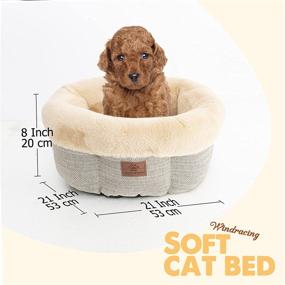 img 3 attached to Cozy Round Donut Cat and Dog Bed - Short Plush, Calming, Anti-Anxiety, Soft Pet Bed for Small and Medium Pets - Machine Washable, Non-Slip Bottom, Includes Cushion