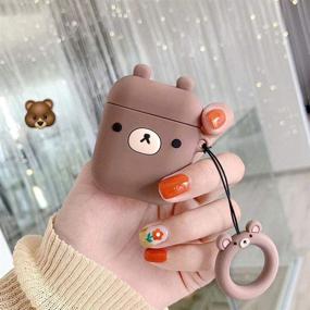 img 2 attached to Чехол из силикона MOLOVA для Airpods 1 и 2, милый смешной герой мультфильма 3D Character Kawaii для Airpods, защита от ударов, совместим с беспроводным зарядным чехлом, с кольцом-ремешком на ключи (коричневый медведь)