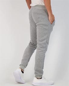 img 1 attached to 👖 Real Essentials 3 Pack: Men's Tech Fleece Active Athletic Jogger Sweatpants with Pockets - Casual and Versatile