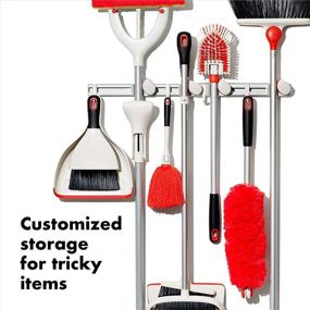 img 2 attached to 🧹 OXO Good Grips Mop and Broom Organizer Rack - Wall-Mounted, 3x5x17 inches