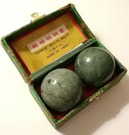 🎾 revitalizing chinese jade balls for healthy exercise and massage - blackish green marble stone logo